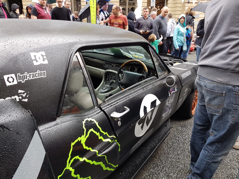 Illustration for article titled Ever seen a Jag XJR with mustang body panels made to look kinda like the hoonicorn?